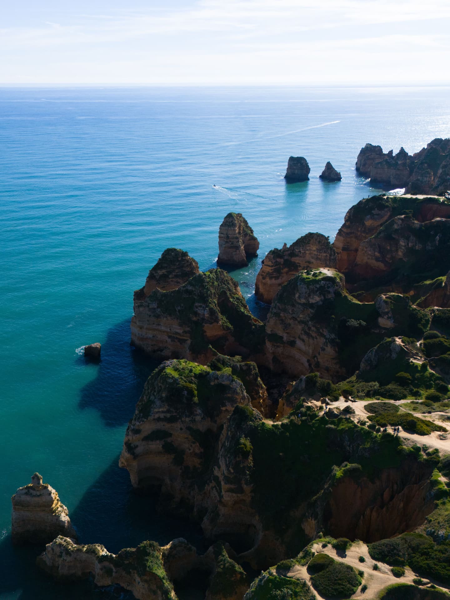 Golden cliffs and sea stacks at Ponta da Piedade